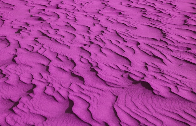 Pop art style purple colored desert sand ripple patterns