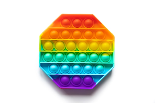 Pop it antistress fidget speelgoed kleurrijke regenboog spel geïsoleerd witte achtergrond