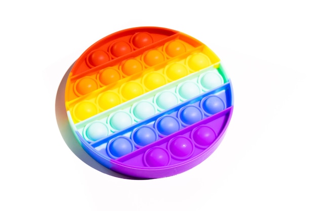 Foto pop it antistress fidget speelgoed kleurrijke regenboog spel geïsoleerde witte achtergrond