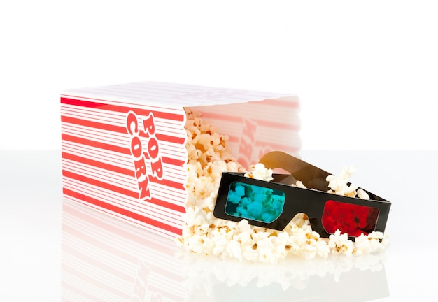 popcorn box with 3d movie glasses on white