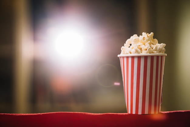 Popcorn bucket on cinema seat back