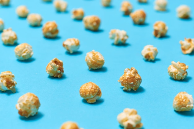 Popcorn candy in pop art style on a blue background