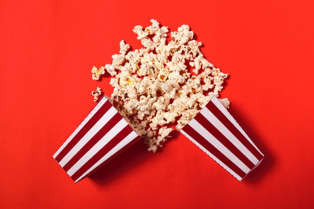 Popcorn on color background