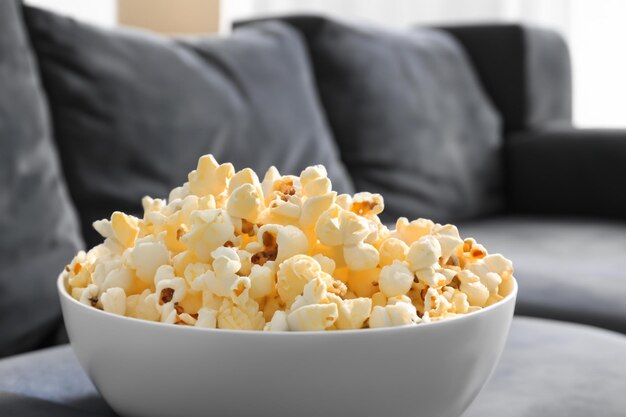 Photo popcorn on comfortable couch