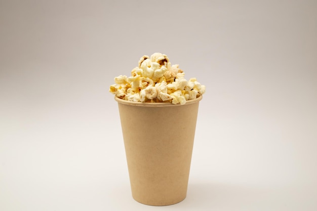 Popcorn in a cup on a white background