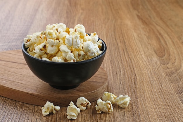 Popcorn a kind of savory snack from corn seed Served in a small bowl selected focus