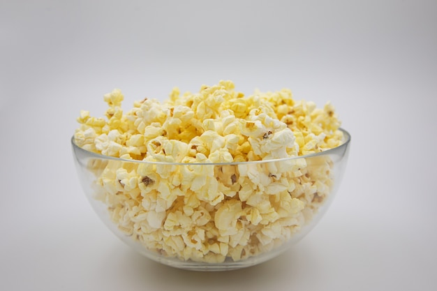 popcorn in oil in a glass plate