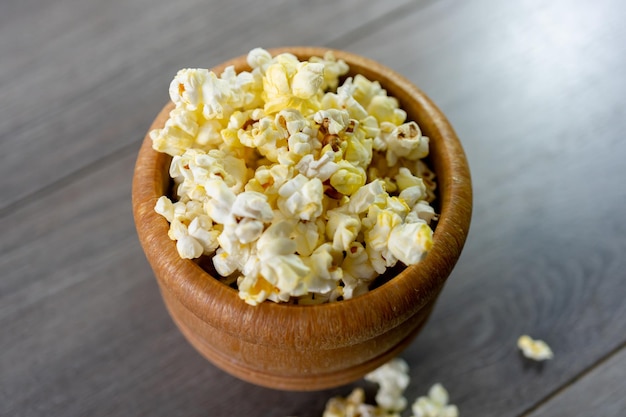 Popcorn snack in a mortar on table top