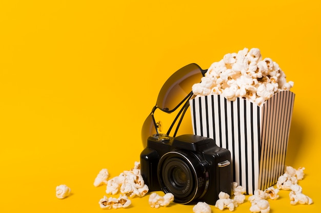 Photo popcorn with camera beside