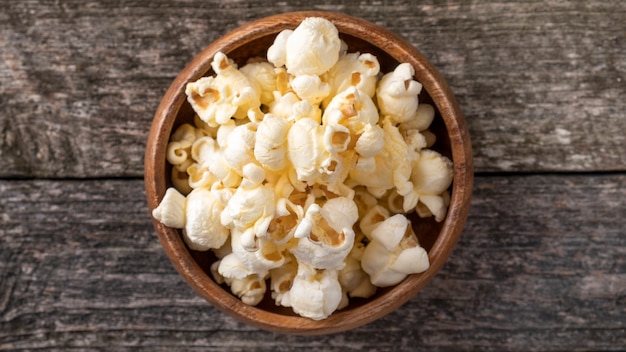 Popcorn in a wooden bowl