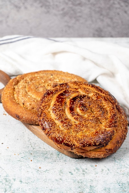 Poppy bread Bread prepared with poppy on stone background close up