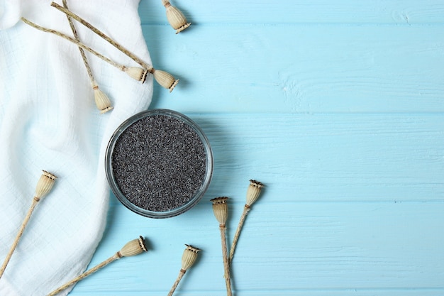 Poppy seeds in a bowl on a table