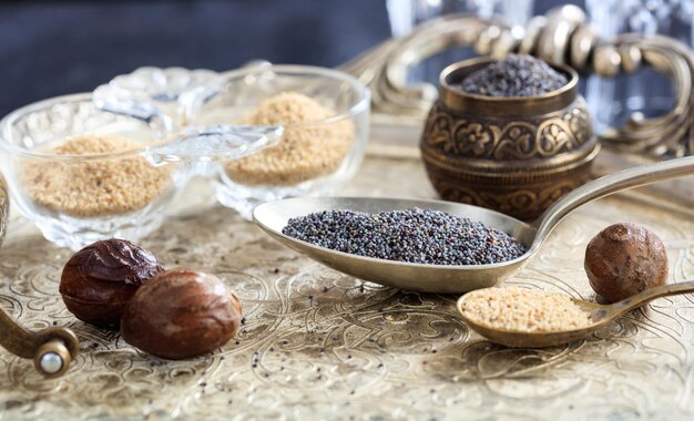 Poppy seeds in spoons