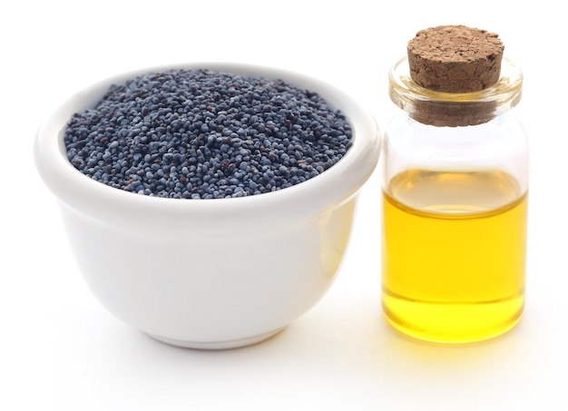 Poppy seeds with essential oil in a small jar