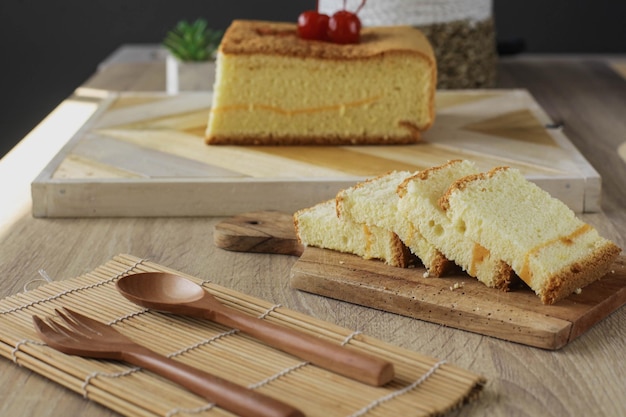 Popular Japanese dessert or sponge cake of castella and castella slices served on a wooden table