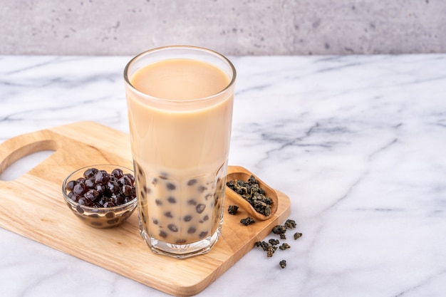 Popular Taiwan drink Bubble milk tea with tapioca pearl ball in drinking glass