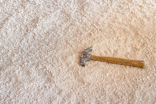 Porcelain clay with hammer for pounding