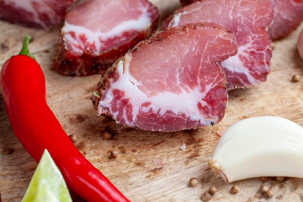 Pork and bacon sliced during cooking