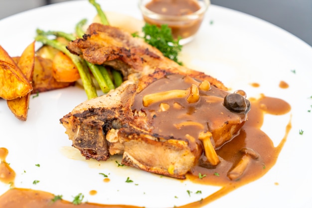 pork chop steak with gravy sauce