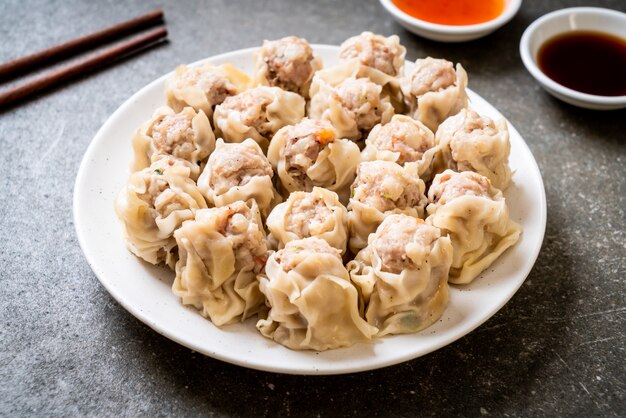 Pork dumplings with sauce