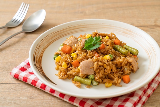 Pork fried rice on white plate