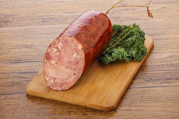 Pork ham sausage over board