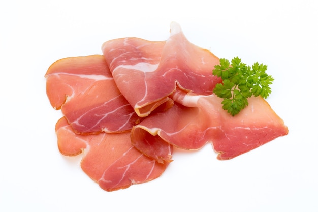 Pork ham slices isolated on white table