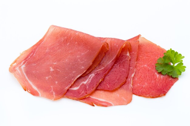 Pork ham slices isolated on white