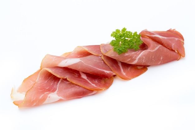 Pork ham slices isolated on white.