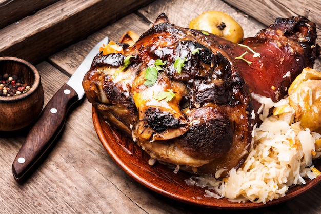 Pork knuckle with fried sauerkraut