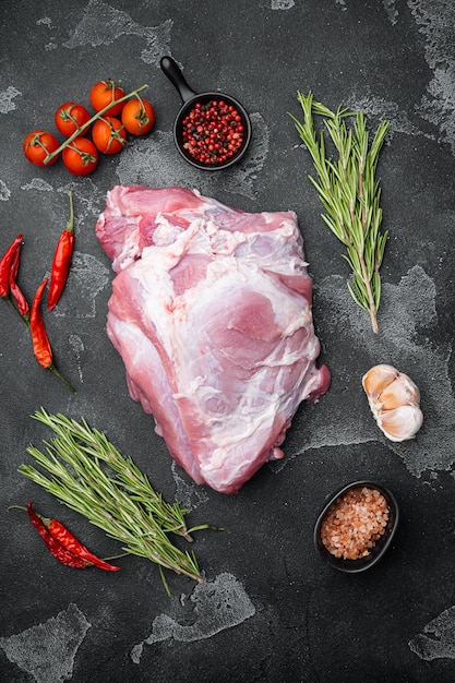 Pork meat ingredients set, on black dark stone table background, top view flat lay