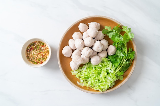 pork meatball with fresh vegetable and spicy dipping sauce