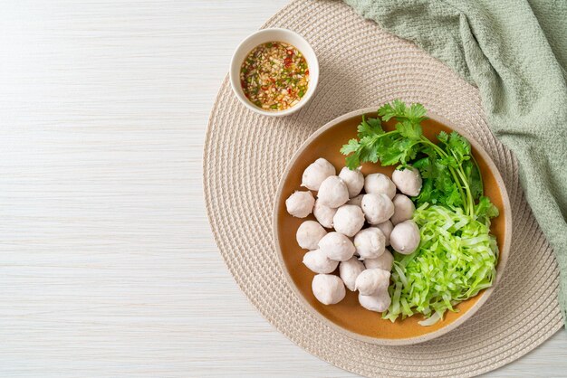 pork meatball with fresh vegetable and spicy dipping sauce