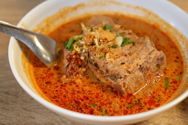 Pork rib boiled in tomyum soup