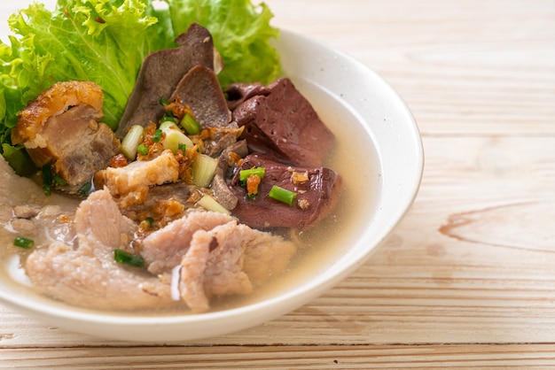 pork's entrails and blood jelly soup bowl with rice - Asian food style