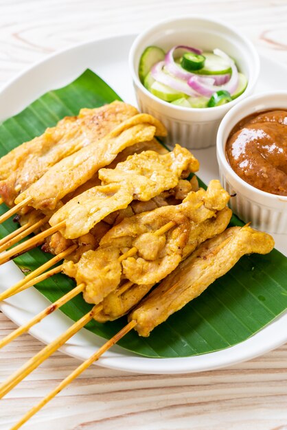 Pork satay - Grilled pork served with peanut sauce or sweet and sour sauce