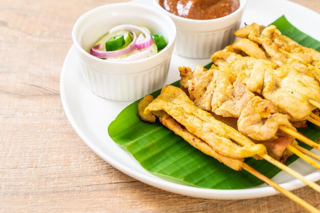 Pork satay - Grilled pork served with peanut sauce or sweet and sour sauce