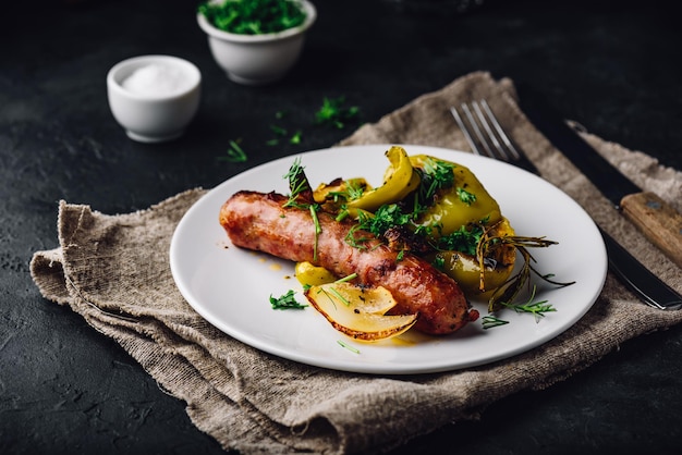 Pork sausage baked with green bell peppers onion and herbs