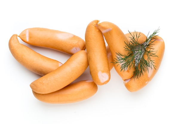 Pork sausage and spice isolated on white table