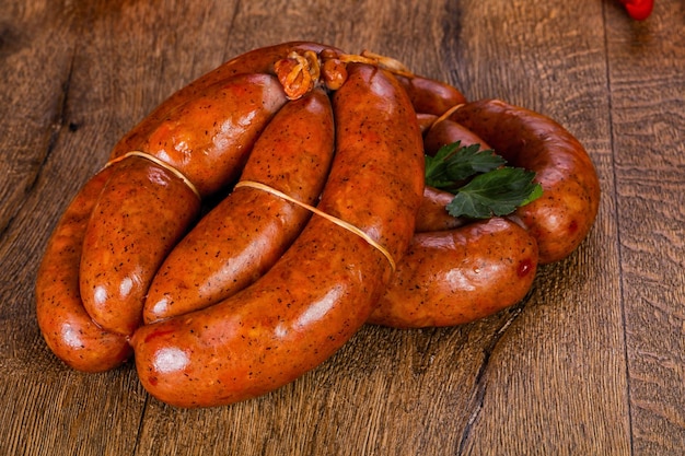 Pork sausages over wooden