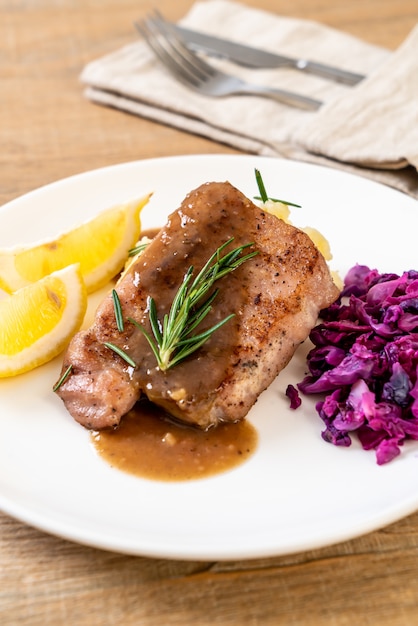 pork steak with red cabbage and mashed potatoes