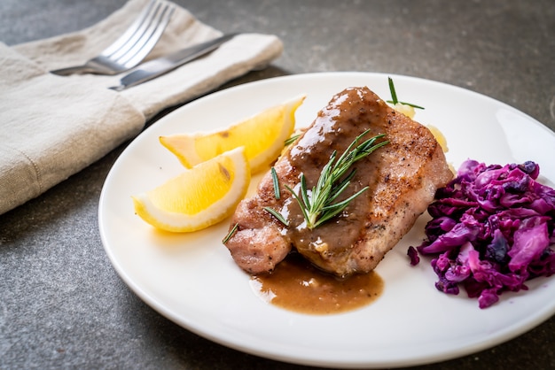 pork steak with red cabbage and mashed potatoes