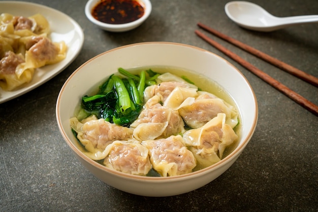 Pork wonton soup or pork dumplings soup with vegetable