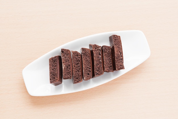 Porous chocolate on a plate