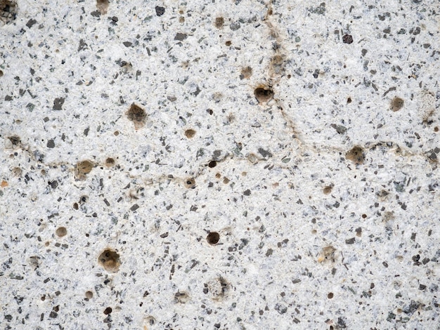 Porous stone surface background from cement concrete wall