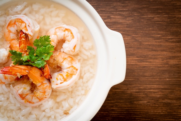 porridge or boiled rice soup with shrimps bowl