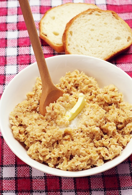 Porridge in bowl with butter