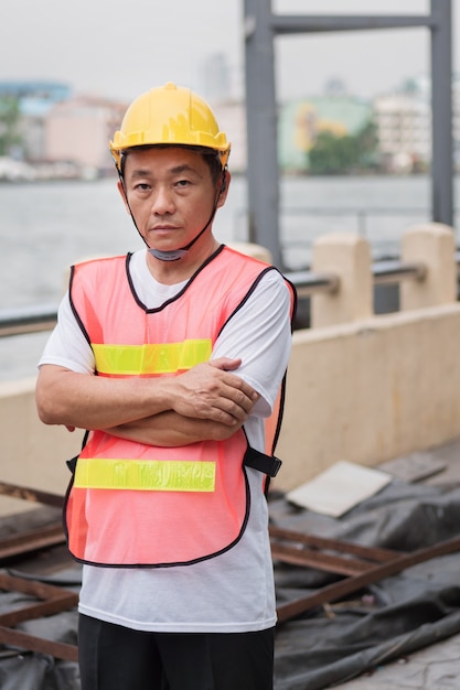 Port labor, industrial logistics working staff standing at working site