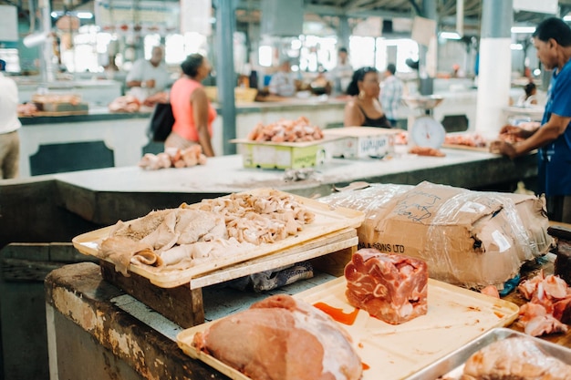 Port louis, mauritius various types of meat for sale at the\
meat stall in the meat market hall in port louis