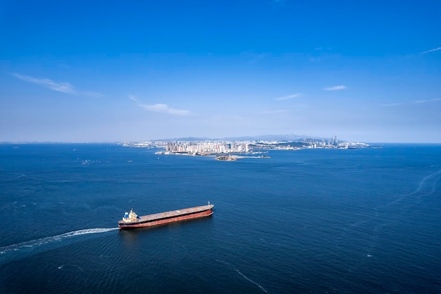 Port terminal freighter and city skyline